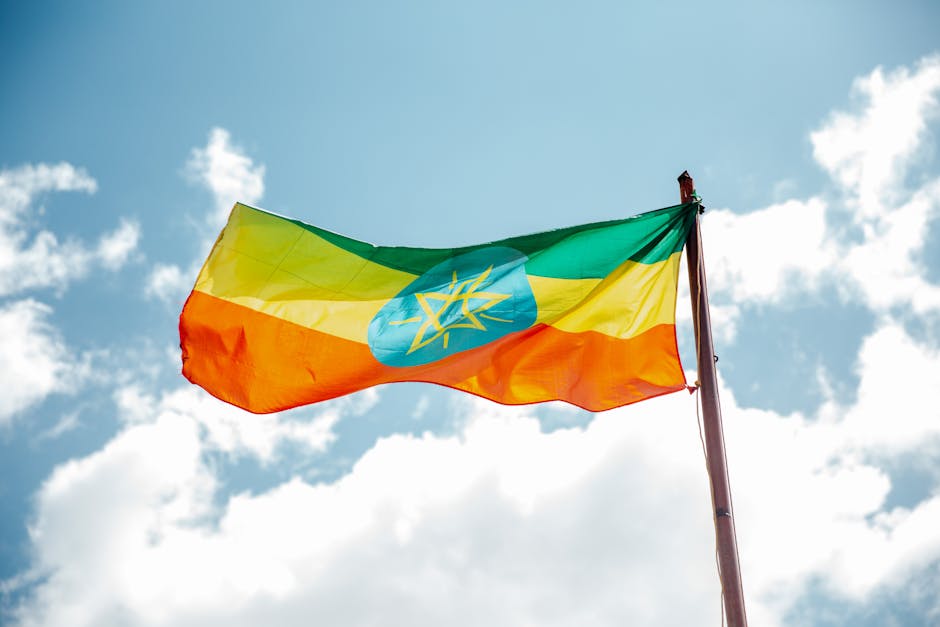 Bunte Nationalflagge Von &auml;thiopien Unter Bew&ouml;lktem Himmel